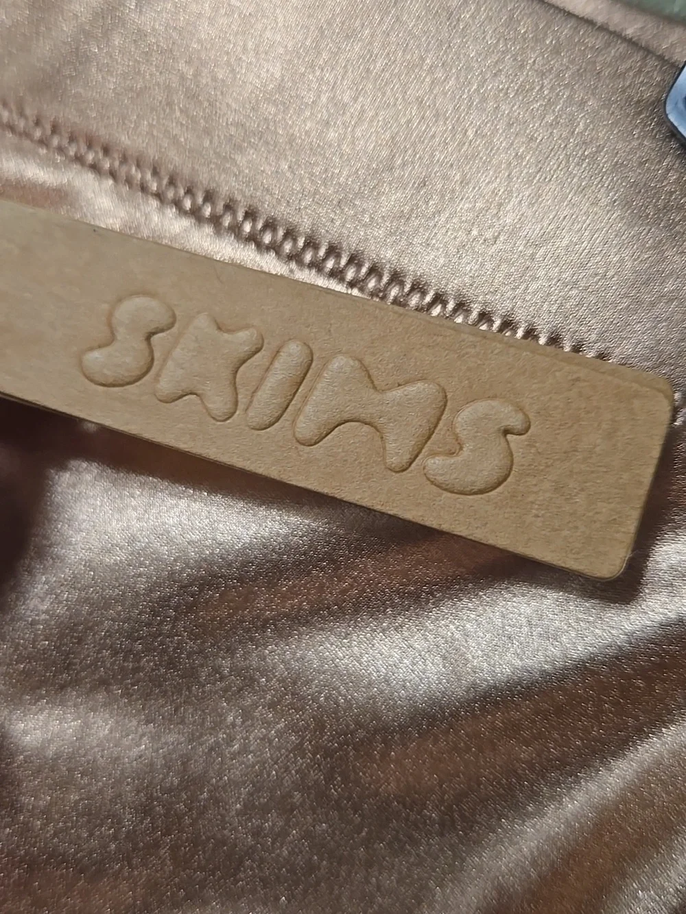 SKIMS Metallic Rose Gold Swim Shorts